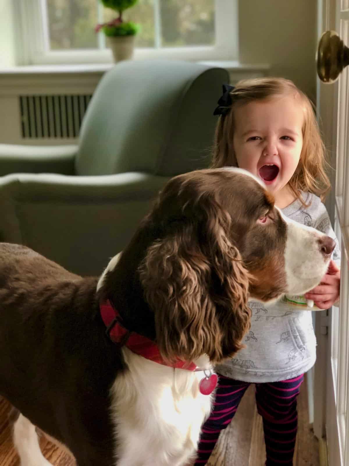 My grand daughter and her dog.