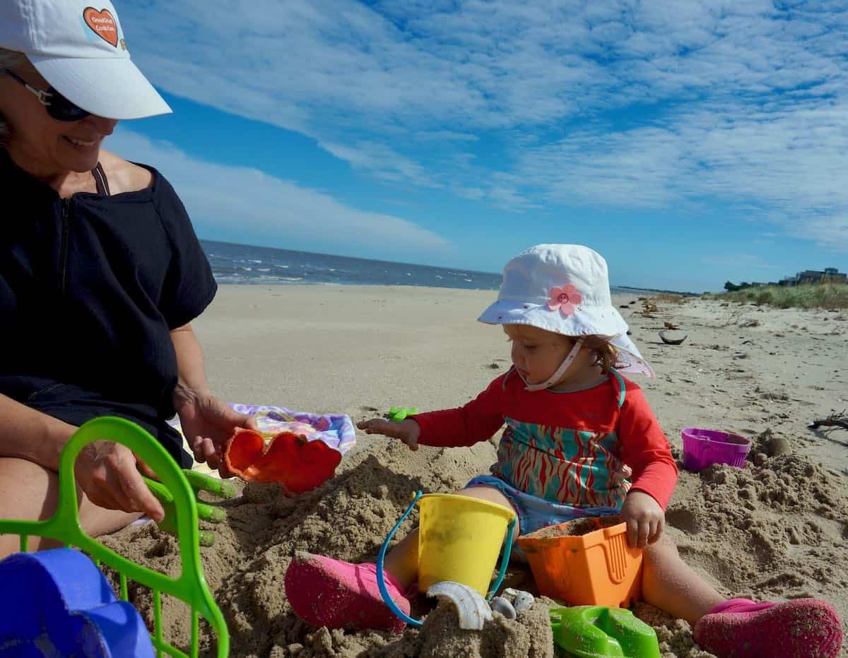 Me and grand daughter playing at the beach.