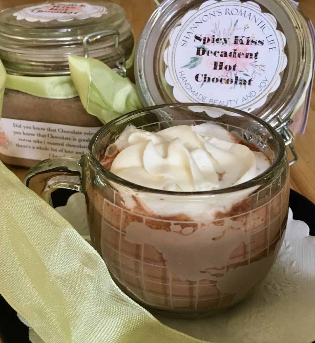 Hot chocolate in cup with product package.