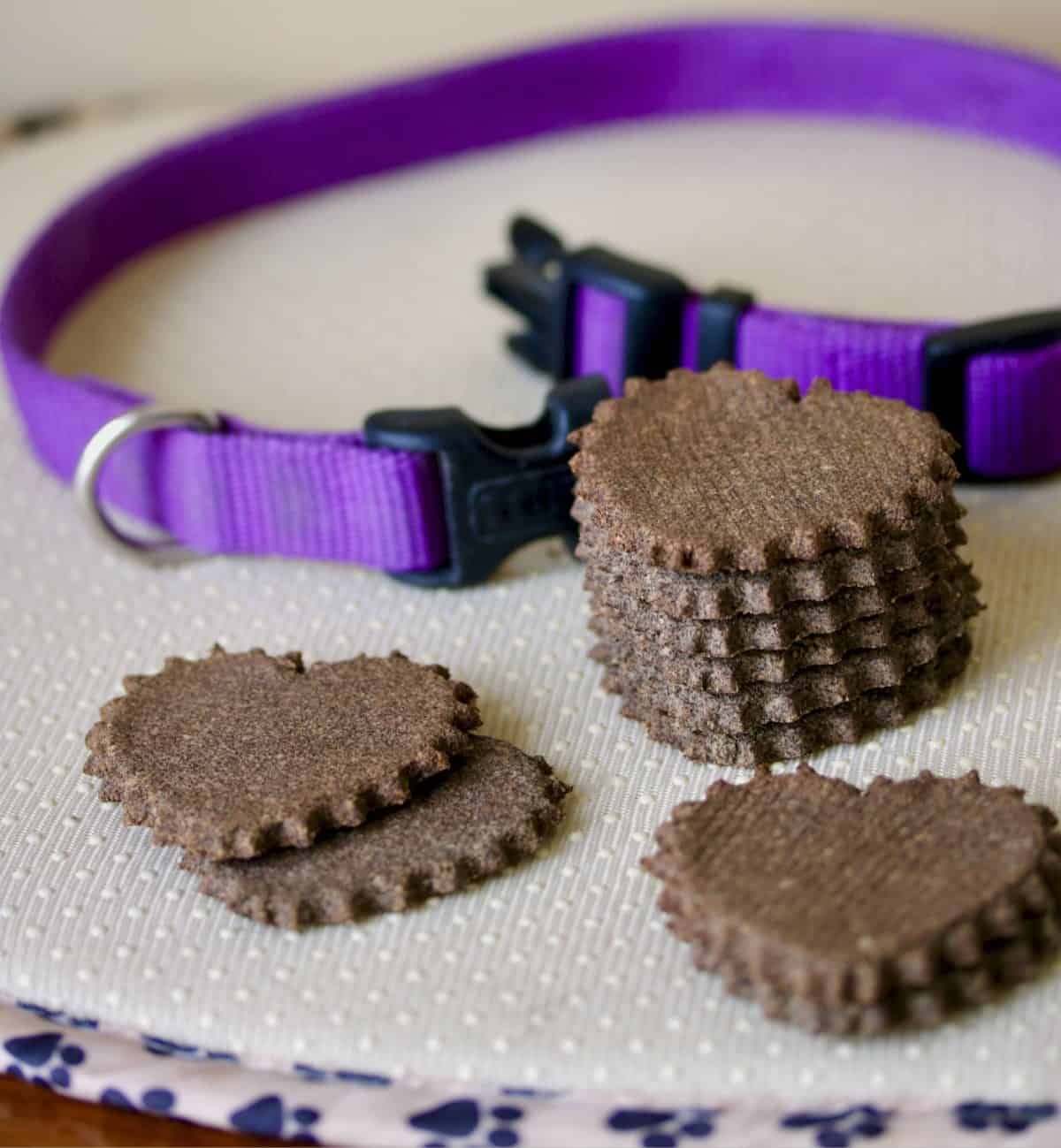 Dogg biscuits and purple dog collar.