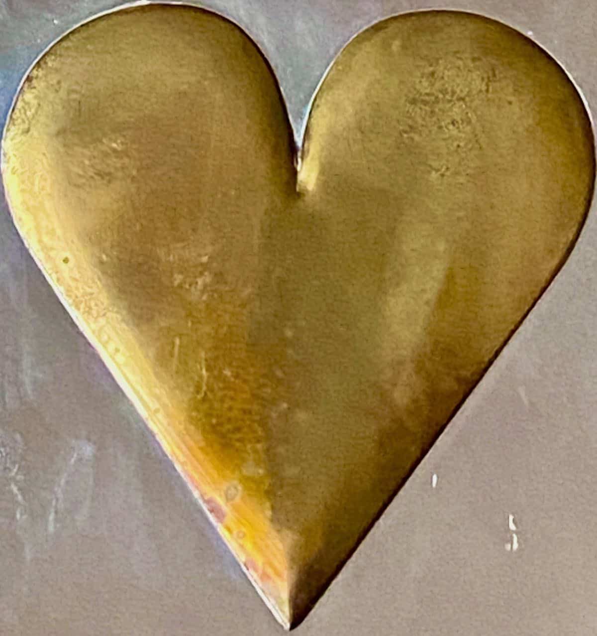 Power of prayer symbolized by this gold heart.