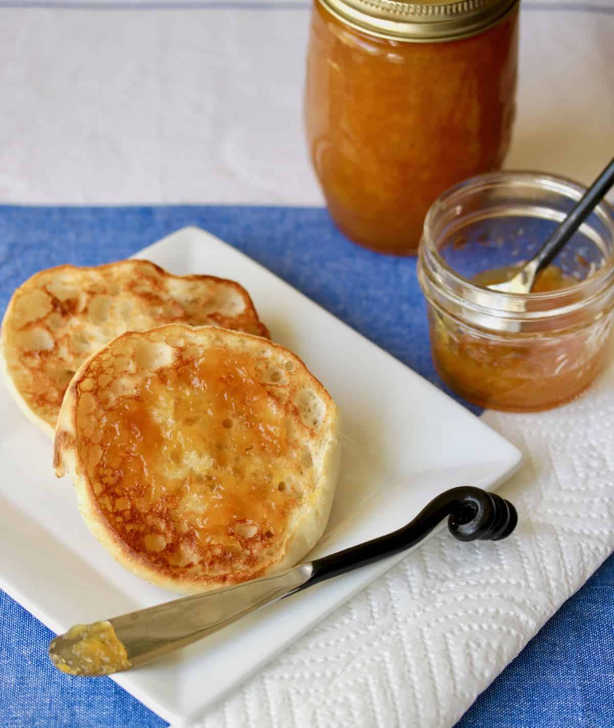 Toasted English muffins with spirited peach jam.