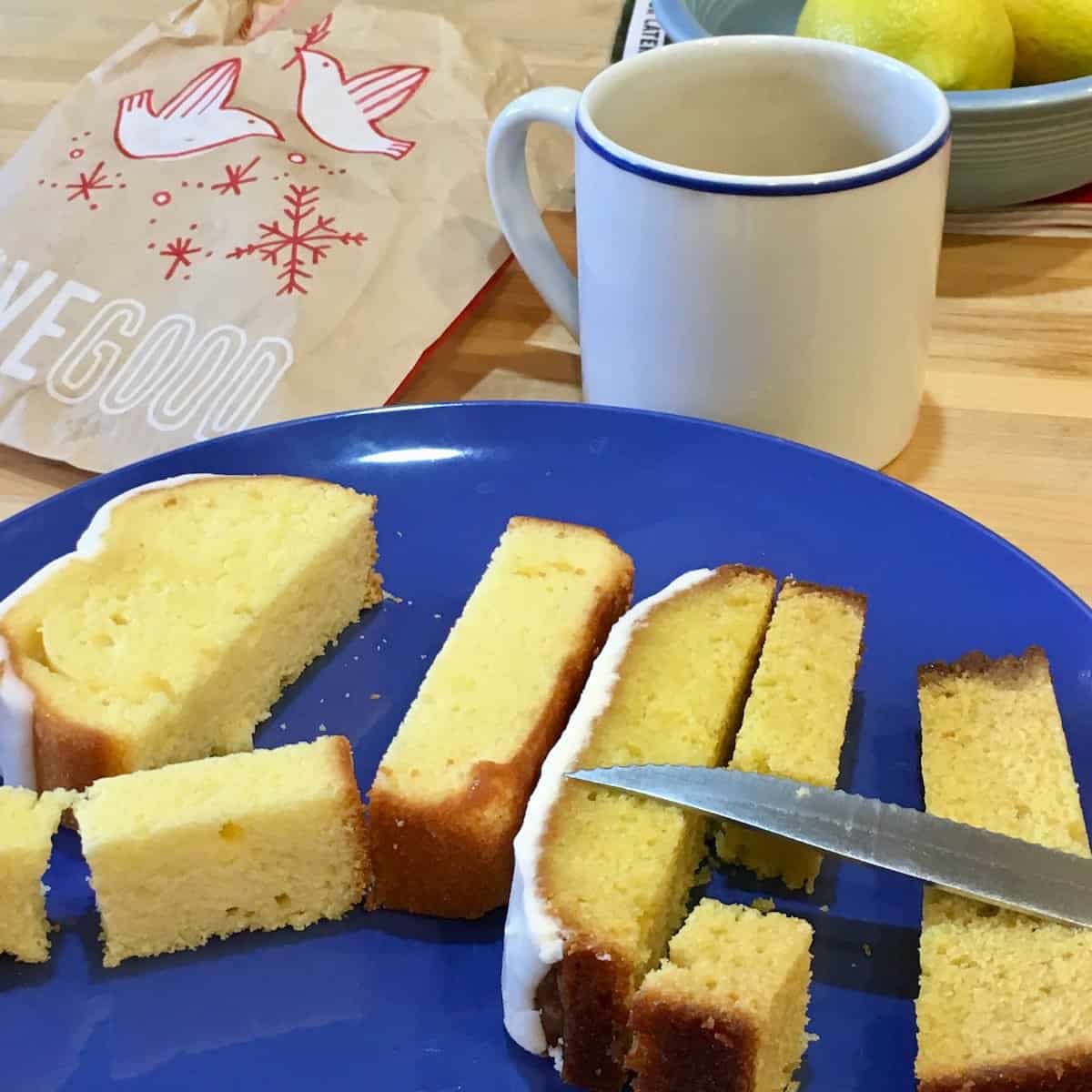 Pieces of lemon cake on blue plate.