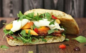Perfect pairings of burrata and bacon sandwich.