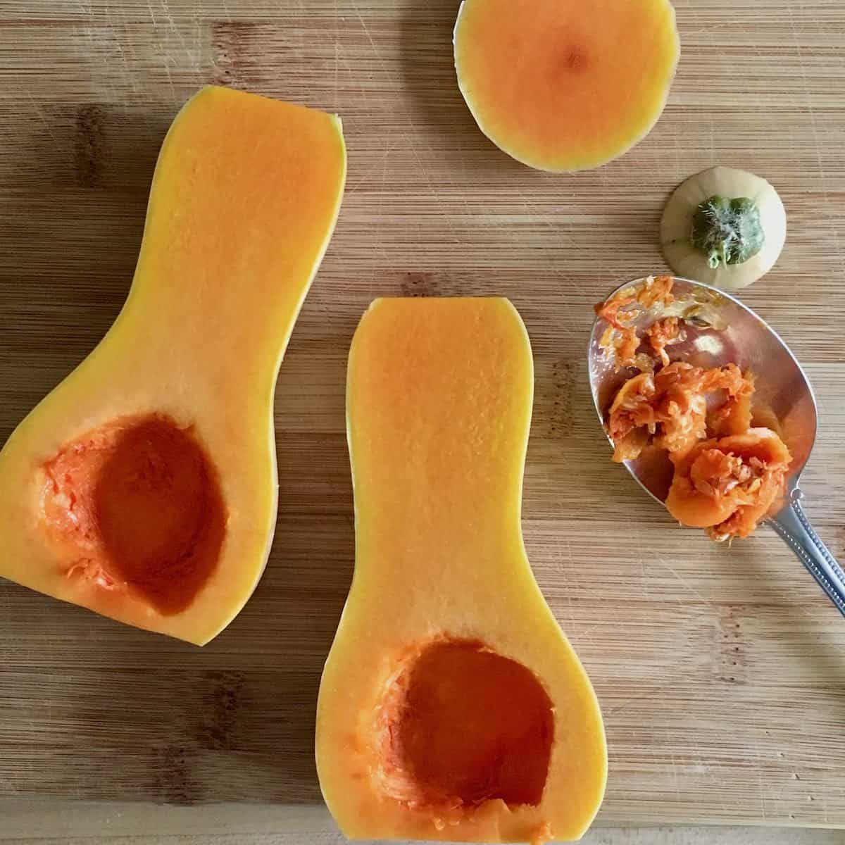 Butternut squash sliced in half seeds scooped out.