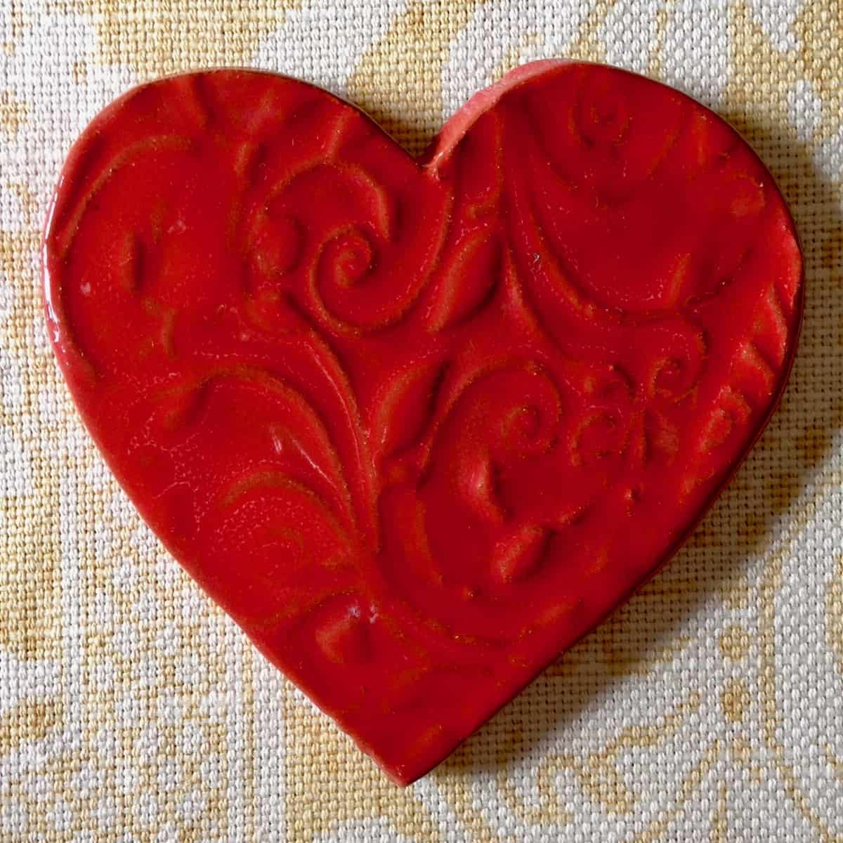 Red heart shaped pottery.