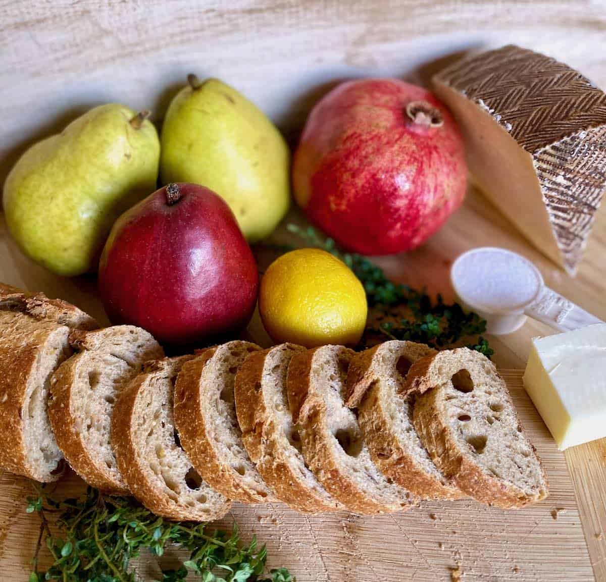 Pear crostini recipe ingredients: pears, bread, cheese, pomegranate, thyme, sugar, lemon.