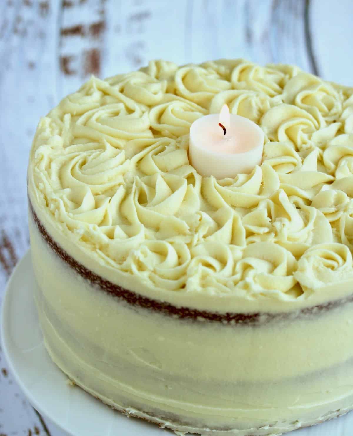 buttermilk cake with a candle to celebrate a life